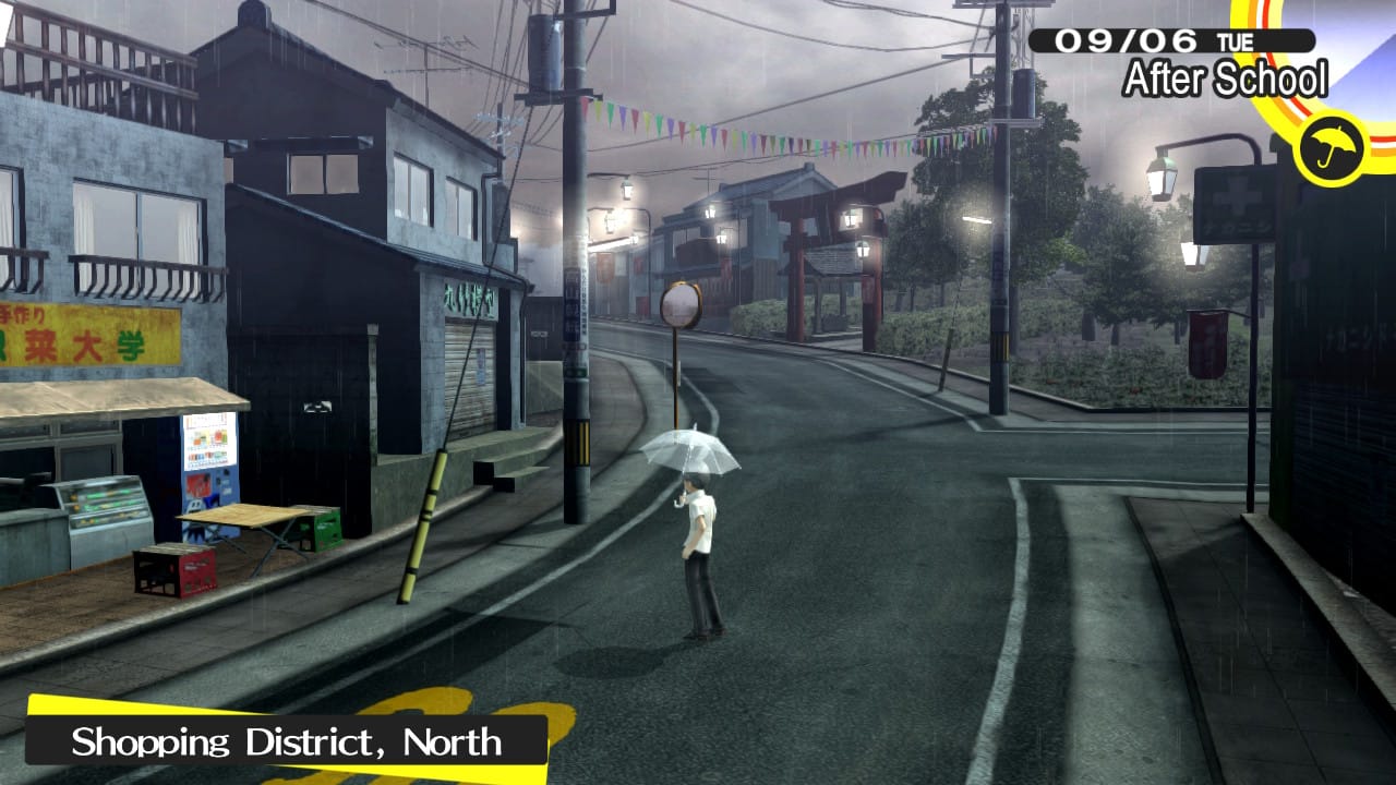 The main street in the Japanese town of Inaba on a grey day, the player-character is holding an umbrella.