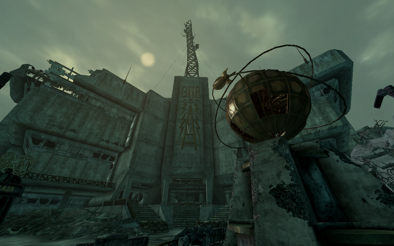 The GNR headquarters in Fallout 3 - a dilapidated concrete building with a golden globe outside, and a GNR sign.