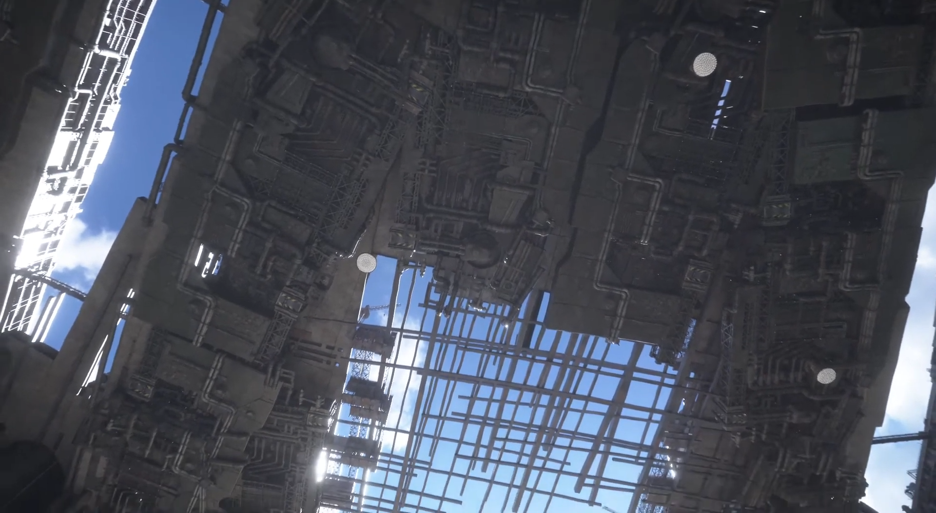 Looking directly up at the skybox in FF7 Remake shows the pipework and metal beams of Midgar.